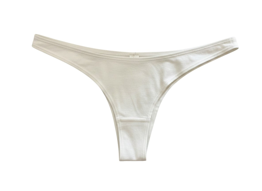 Flipflop and Treacle off-white organic cotton Brazilian bikini bottom with a minimalist cut.
